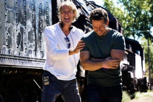 Left to right: Director/Executive Producer Michael Bay with Mark Wahlberg (as Cade Yeager) on the set of TRANSFORMERS: AGE OF EXTINCTION, from Paramount Pictures.